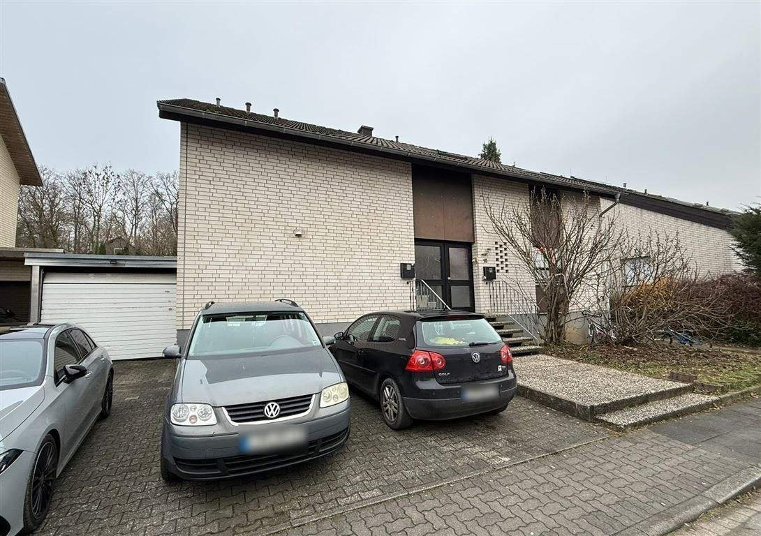 Dreifaches Wohnpotenzial:  Zweifamilienhaus mit Einliegerwohnung