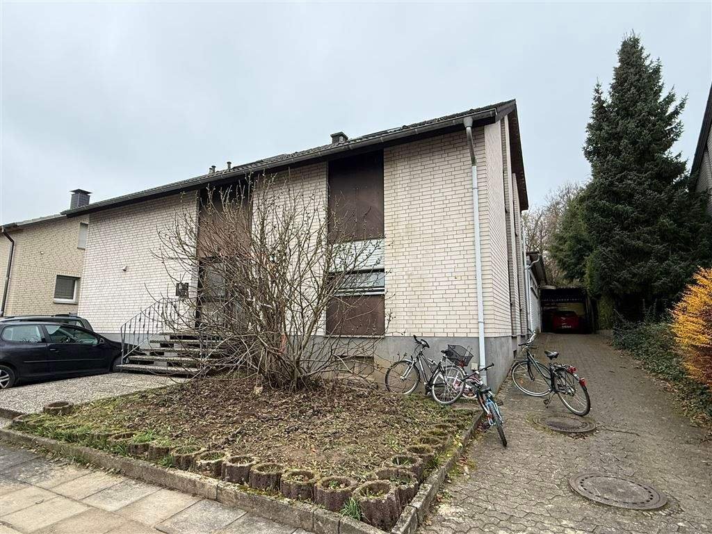 Dreifaches Wohnpotenzial:  Zweifamilienhaus mit Einliegerwohnung