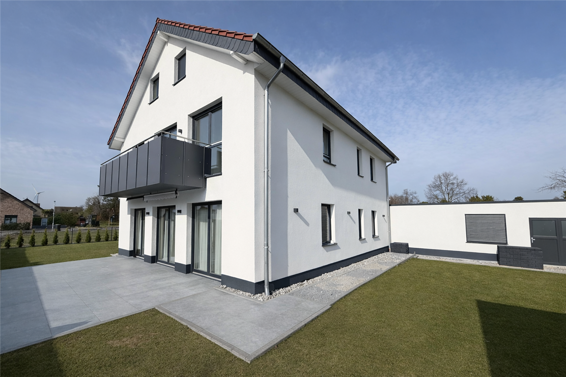 Neuwertiges 3-Familienhaus in Werther  (Westfalen) – KfW-55-Neubau 2024 mit  Luftwärmepumpe, Solaranlage & Top Ausstattung! 