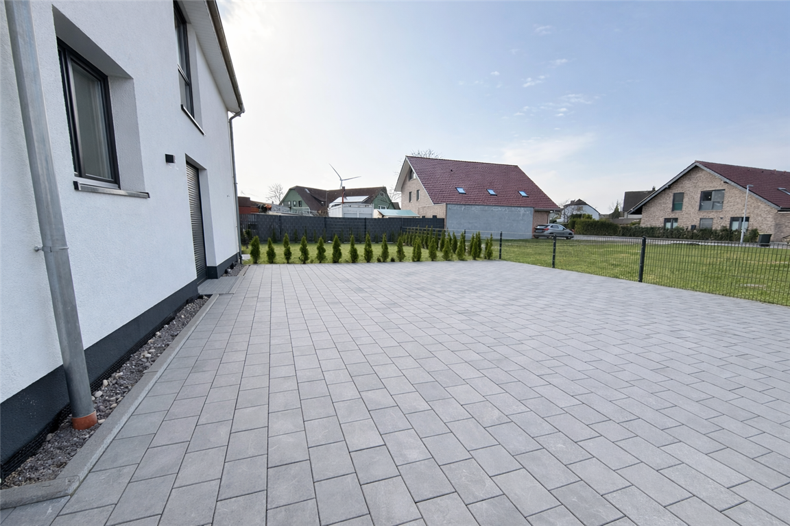 Neuwertiges 3-Familienhaus in Werther  (Westfalen) – KfW-55-Neubau 2024 mit  Luftwärmepumpe, Solaranlage & Top Ausstattung! 