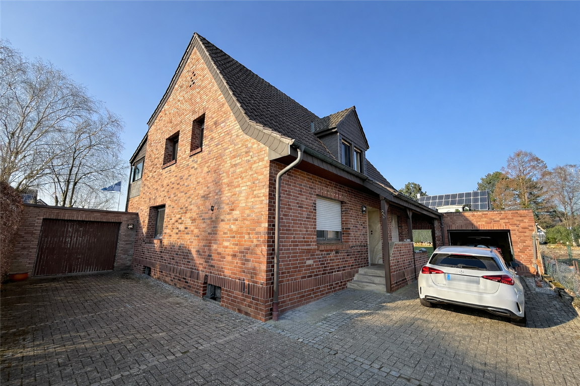 Einfamilienhaus mit großem  Grundstück, zwei Garagen und  vielseitigem Platzangebot in Hörstel Riesenbeck