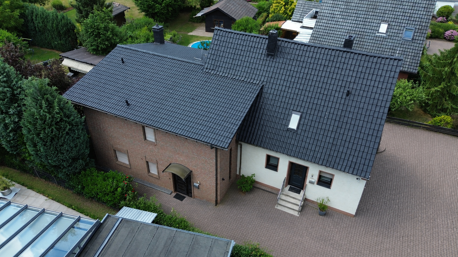 Zusätzliches Baugrundstück inklusive – großzügiges Familienhaus mit Wintergarten und weitläufigem Traumgarten